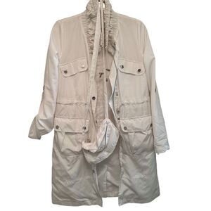 Black Rivet white rain coat